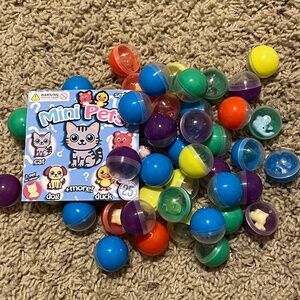 50 pack of Mini Pets 1 inch capsule toys
